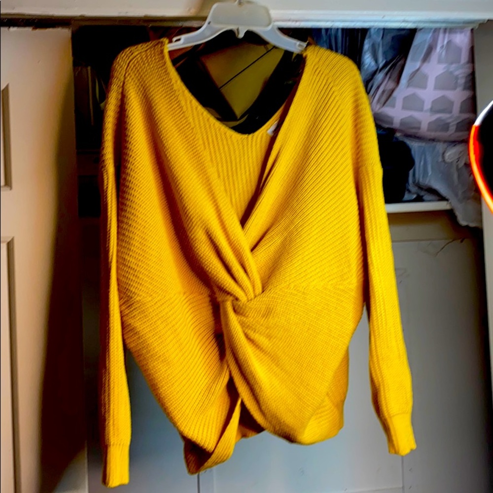 Cross front sweater